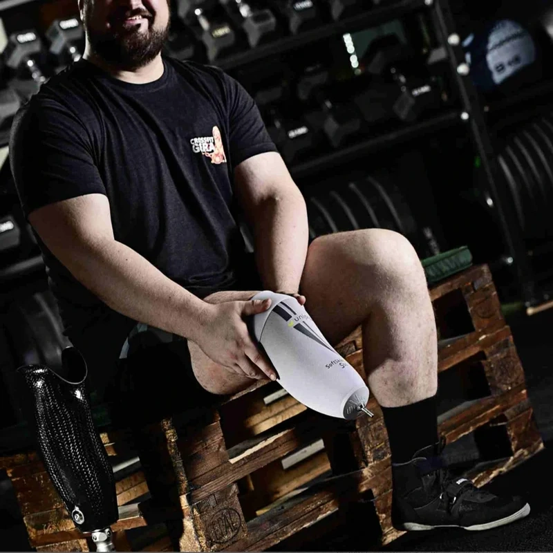Prosthesis user holding an Uniprox SoftskinAir® silicone liner